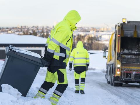 Staff working on waste collection during winter.