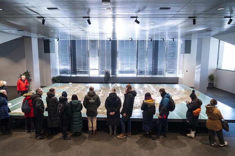 Photo of visitors viewing the Iceland Replica in Tjarnarsalur at Reykjavík City Hall.